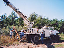 Northeast Texas Power crew installing a pole
